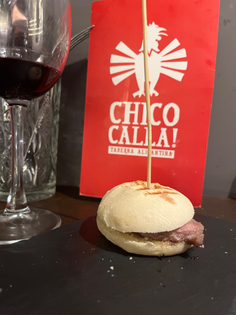 Menu of Restaurants in Alicante, Chico Calla | C/ San Francisco, PORTICHOL montadito de salchicha blanca casera de Monforte, queso y cebolla