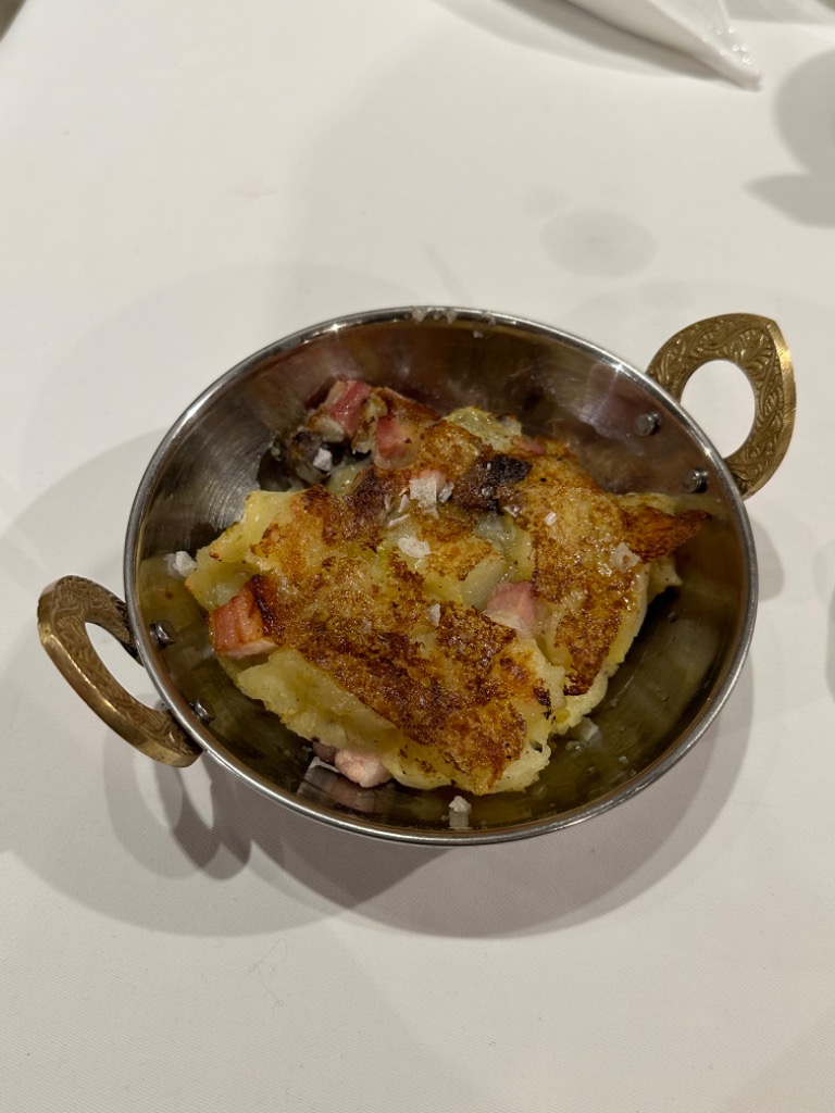 Menu of Restaurants in Cassà de la Selva, Can Peret, Trinchado de la cerdaña trufado con tocino y butifarra negra