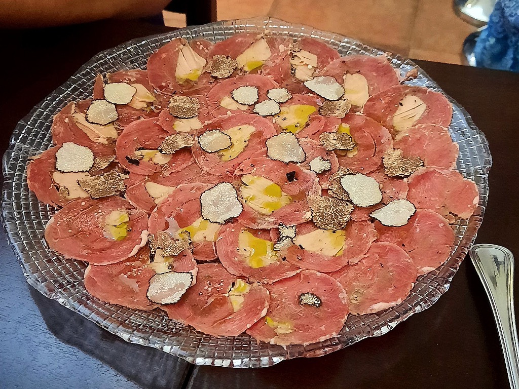Menu of Restaurants in Chiclana de la Frontera, Pizzería Trattoria Soave, Carpaccio de Magret de Pato con Foie y Trufa laminada