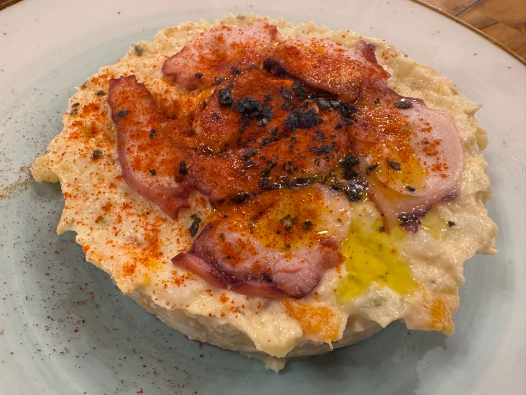 Menu of Restaurants in Cordova, Restaurante Casa Rubio, Nuestra ensaladilla de atún con carpaccio de pulpo y pimentón