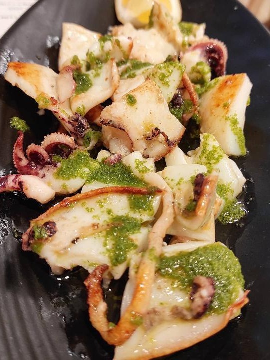 Menu of Restaurants in Denia, Tasca Eulalia, Sepia a la planca con picadillo de ajo y perejil