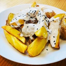 Carta de Restaurantes en Madrid, La Alpargata - Taberna Vegana, Patatas gajo con salsa de queso