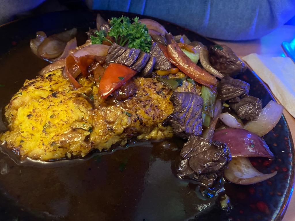 Menu of Restaurants in Málaga, La Pachamama - Cocina Peruana, Tacu Tacu con lomo saltado