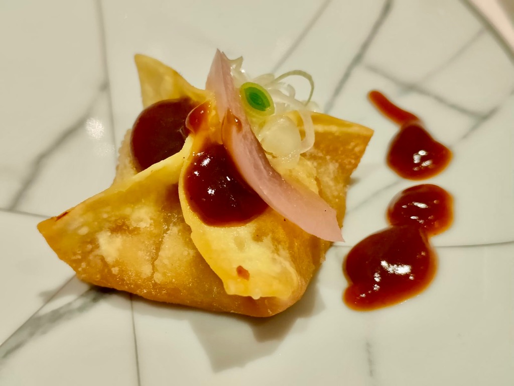 Menu of Restaurants in Oviedo, Restaurante Doña Concha, Dumplings de carabineros con salsa XO (4uds)