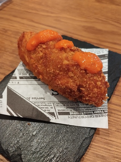 Carta de Restaurantes en Pamplona, Restaurante Casa Paco, Croqueta de calçots confitados con salsa romesco