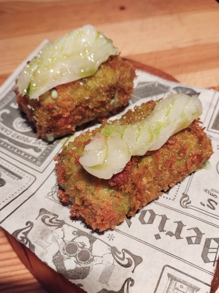 Menu of Restaurants in Pamplona, Restaurante La Vieja Iruña, Croqueta de merluza en salsa verde